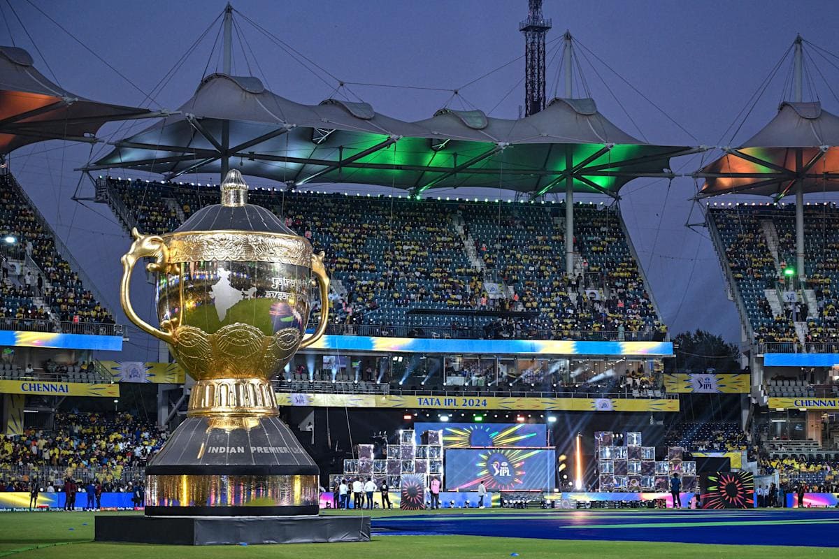 IPL 2025 Trophy with stadium background